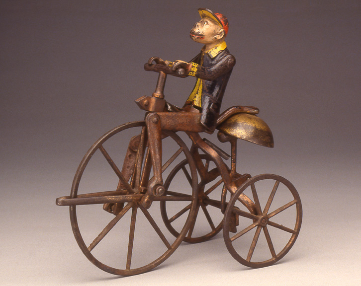 Monkey On Bell Tricycle, 1896<br>
J. & E. Stevens Co., Cromwell, Connecticut<br>
Painted cast iron<br>
United States


